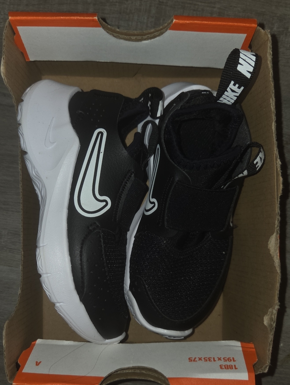 Nike Kids Black and White Slip-On Athletic Sneakers